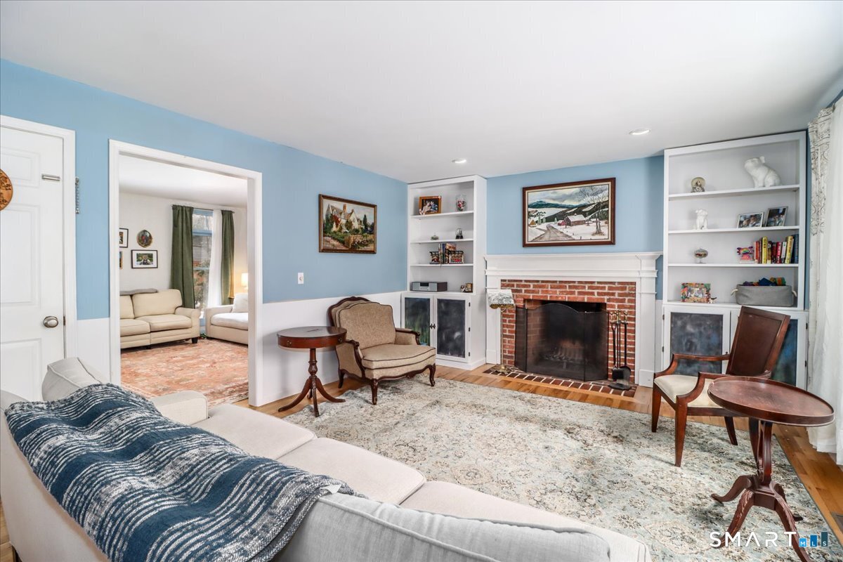 52 Key Rock Road Newtown, CT 06470 - Photo 10 of 40 a living room with furniture and a fireplace