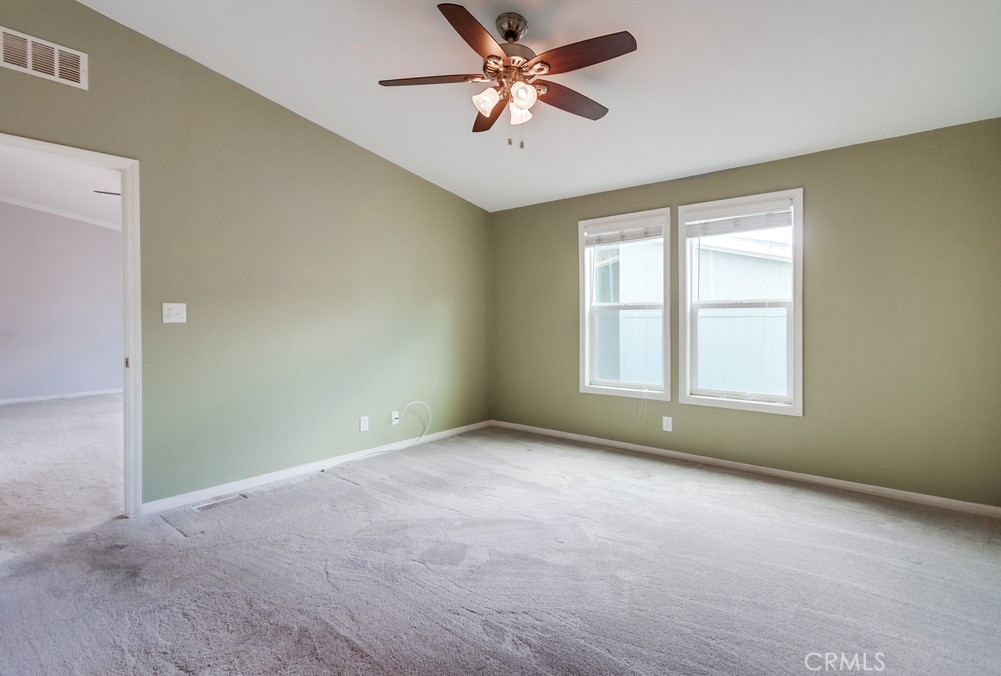 3909 Reche Road, Unit 185 Fallbrook, CA 92028 - Photo 14 of 22 a view of an empty room with a window