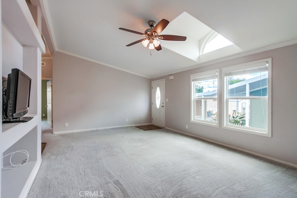 3909 Reche Road, Unit 185 Fallbrook, CA 92028 - Photo 19 of 22 a view of an empty room with a window