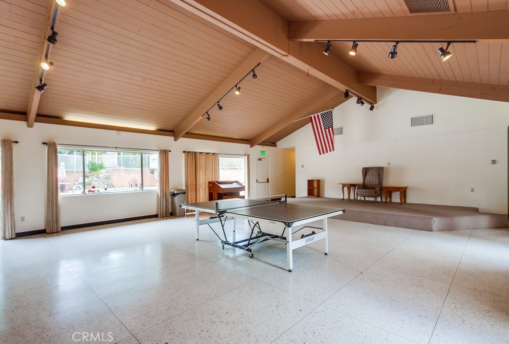 3909 Reche Road, Unit 185 Fallbrook, CA 92028 - Photo 6 of 22 a living room with furniture window and wooden floor