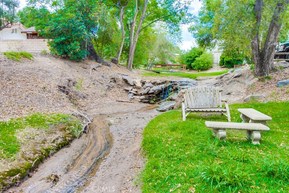 3909 Reche Road, Unit 185 Fallbrook, CA 92028 - Photo 7 of 22 a view of a park with large trees