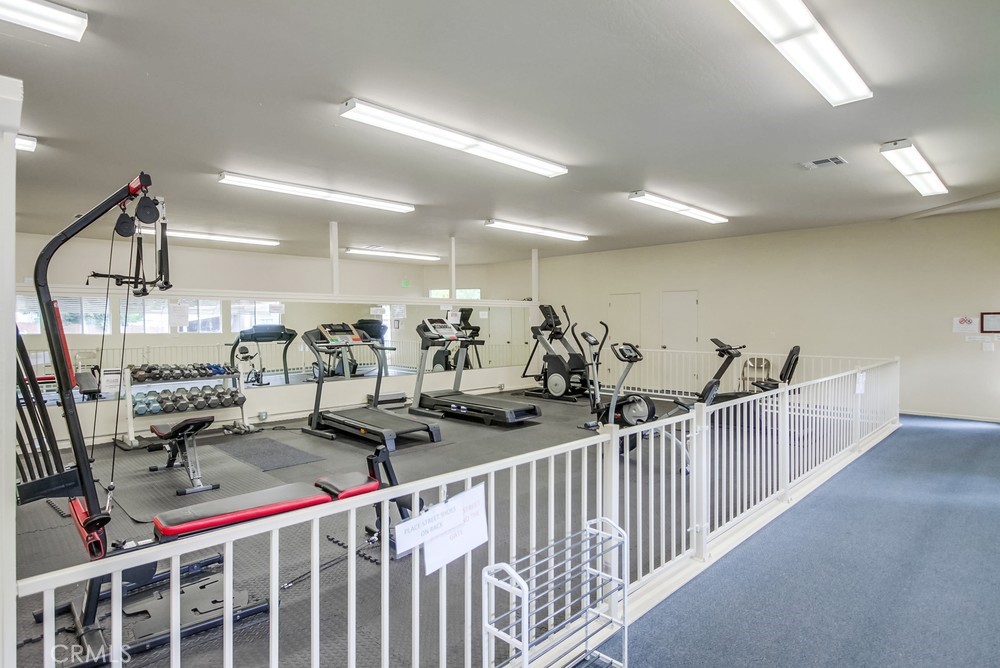 3909 Reche Road, Unit 185 Fallbrook, CA 92028 - Photo 8 of 22 a view of a hallway with workspace