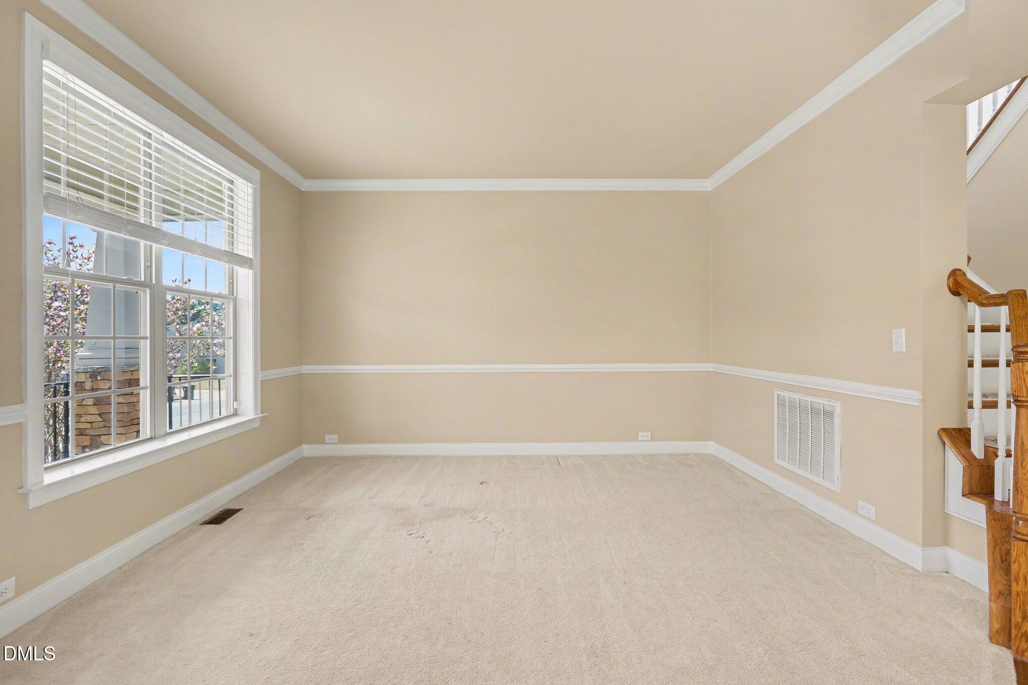 351 Gartrell Way Cary, NC 27519 - Photo 37 of 51 a view of an empty room with a window