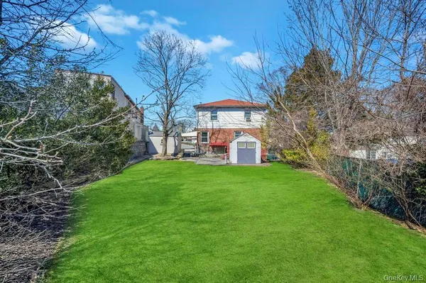 a view of a backyard with garden