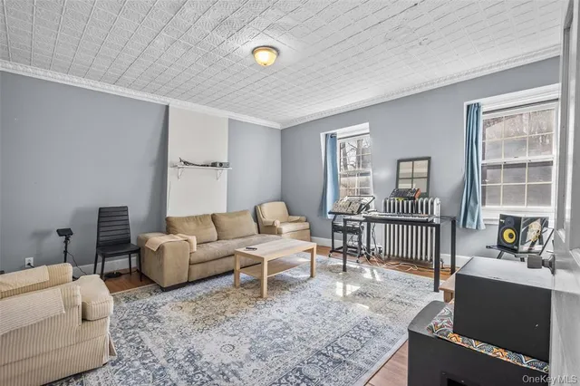 a living room with furniture and a table