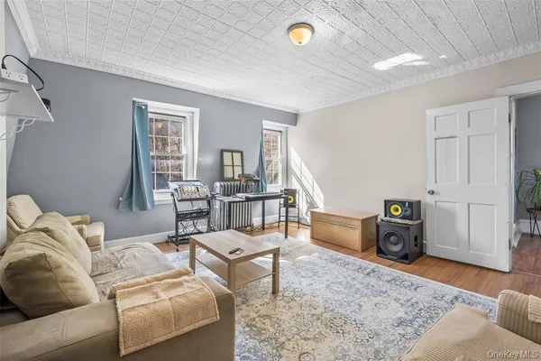 a living room with furniture and a couch