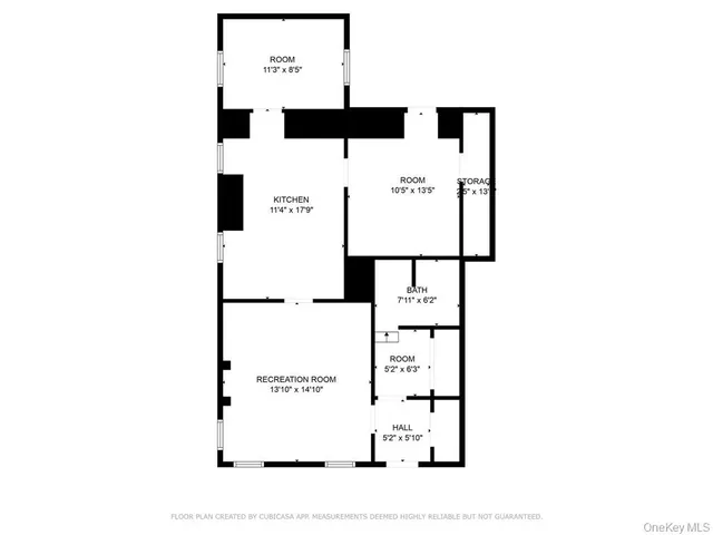 a picture of a bench in front of a wall