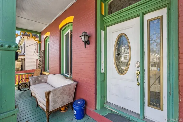 a outdoor living space with furniture and a potted plant