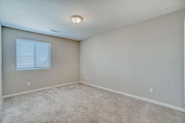 an empty room with a workbench