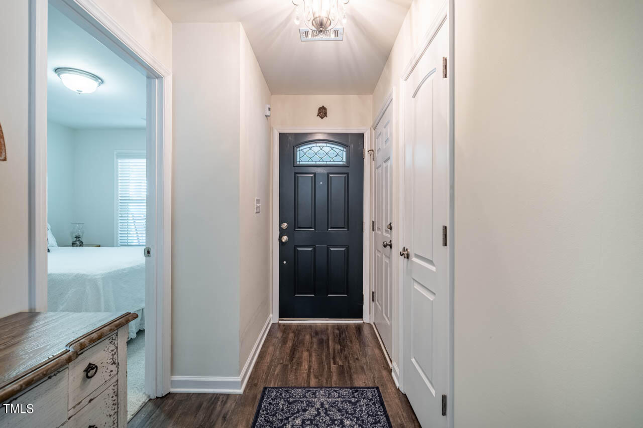 12 Pendleton Court Durham, NC 27713 - Photo 3 of 23 a view of a hallway view with wooden floor