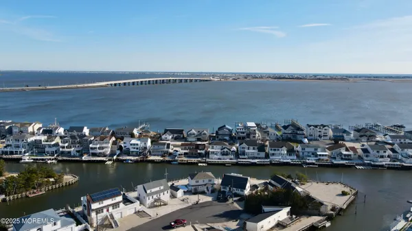 an aerial view of a city with houses view