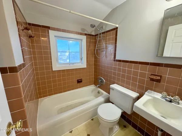 a bathroom with a sink and a toilet