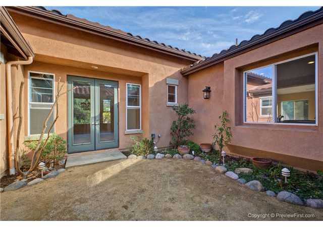 421 Hickoryhill Drive Encinitas, CA 92024 - Photo 6 of 23 Outdoor Courtyard with fireplace.