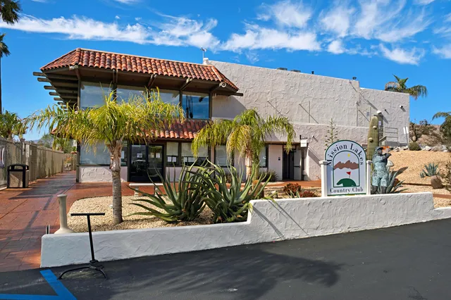 a view of a chairs and table in the patio