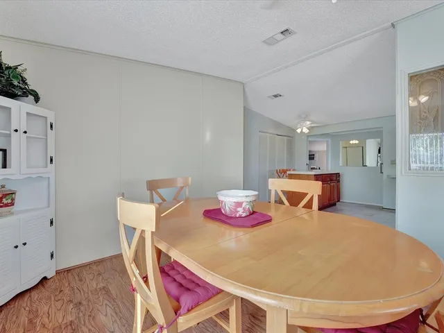 a view of a dining room with furniture