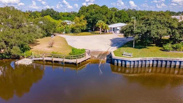 a view of a swimming pool with a patio