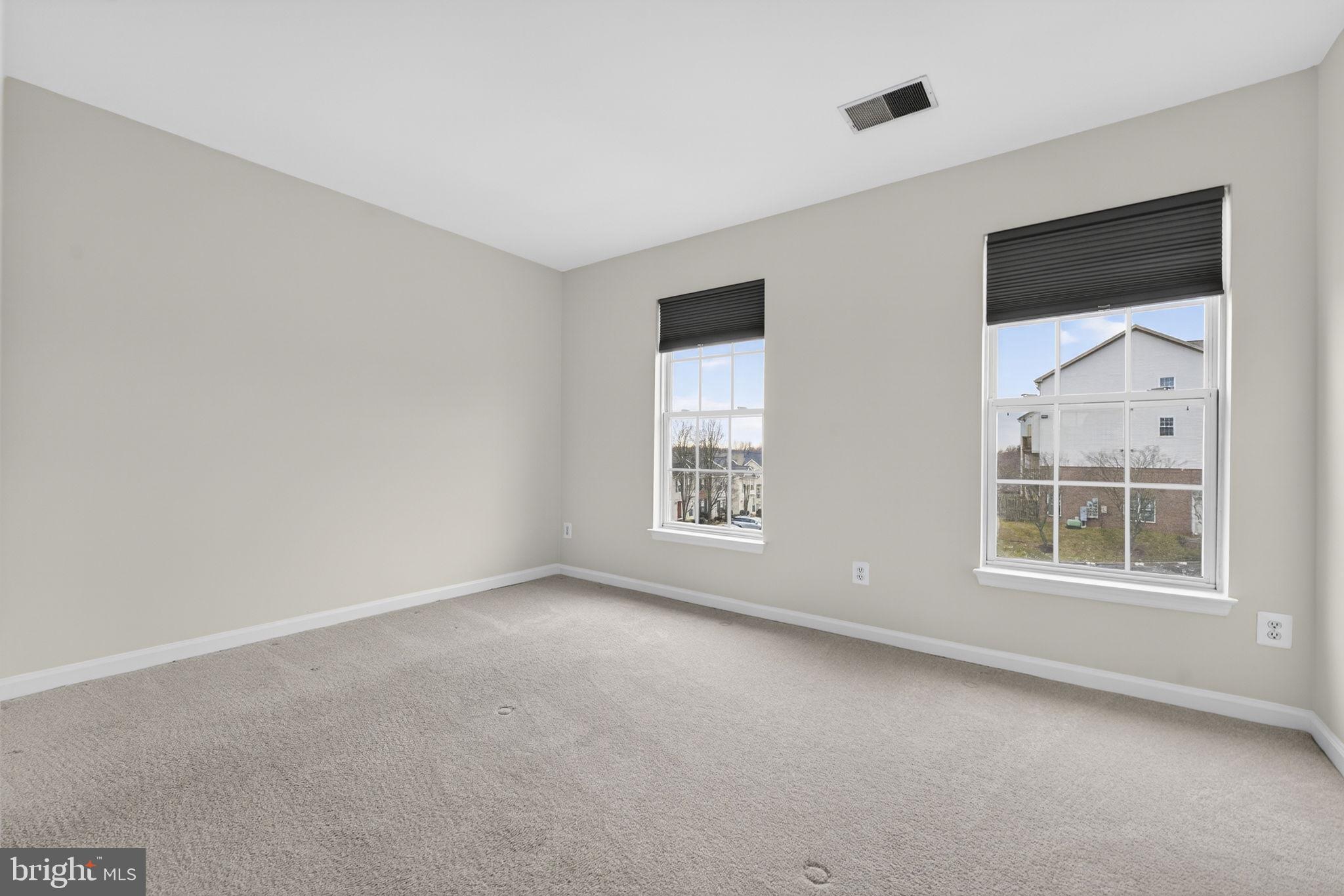 6741 Stone Maple Terrace Centreville, VA 20121 - Photo 17 of 24 an empty room with windows