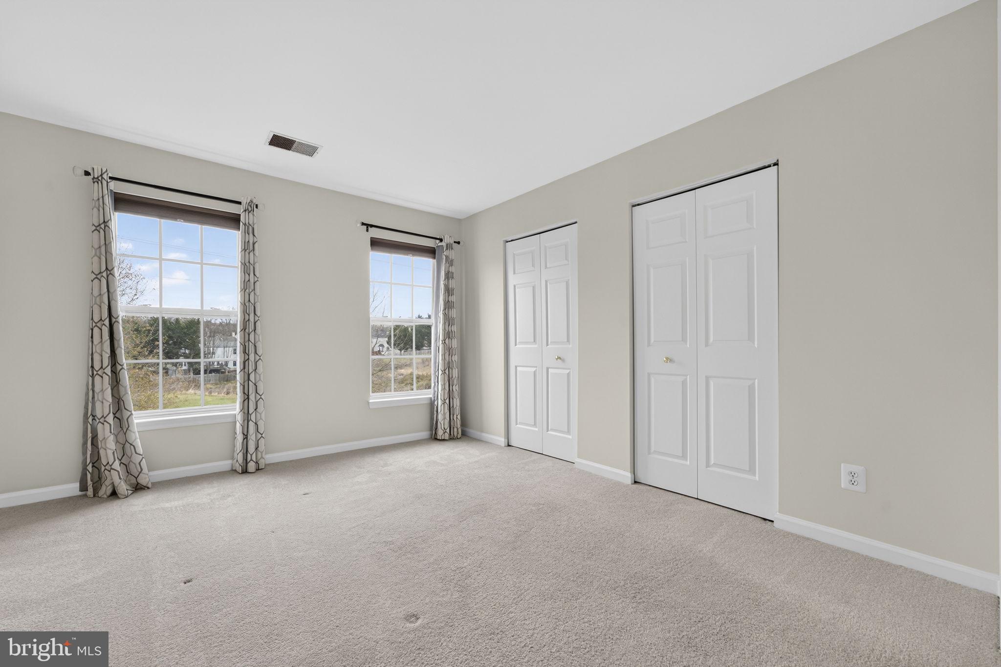6741 Stone Maple Terrace Centreville, VA 20121 - Photo 21 of 24 a view of an empty room with a window