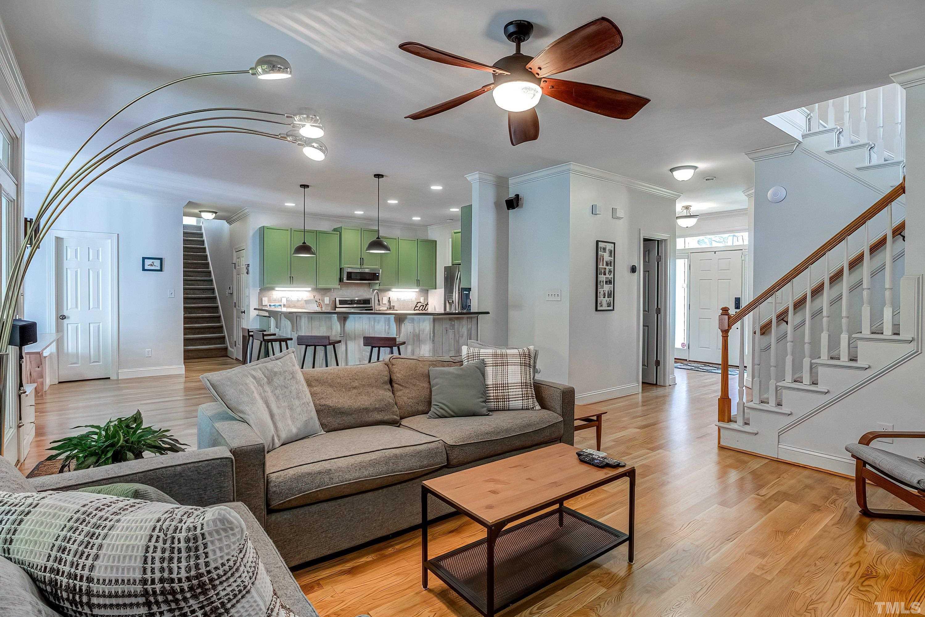 1613 Strategy Way Wake Forest, NC 27587 - Photo 13 of 58 a living room with furniture