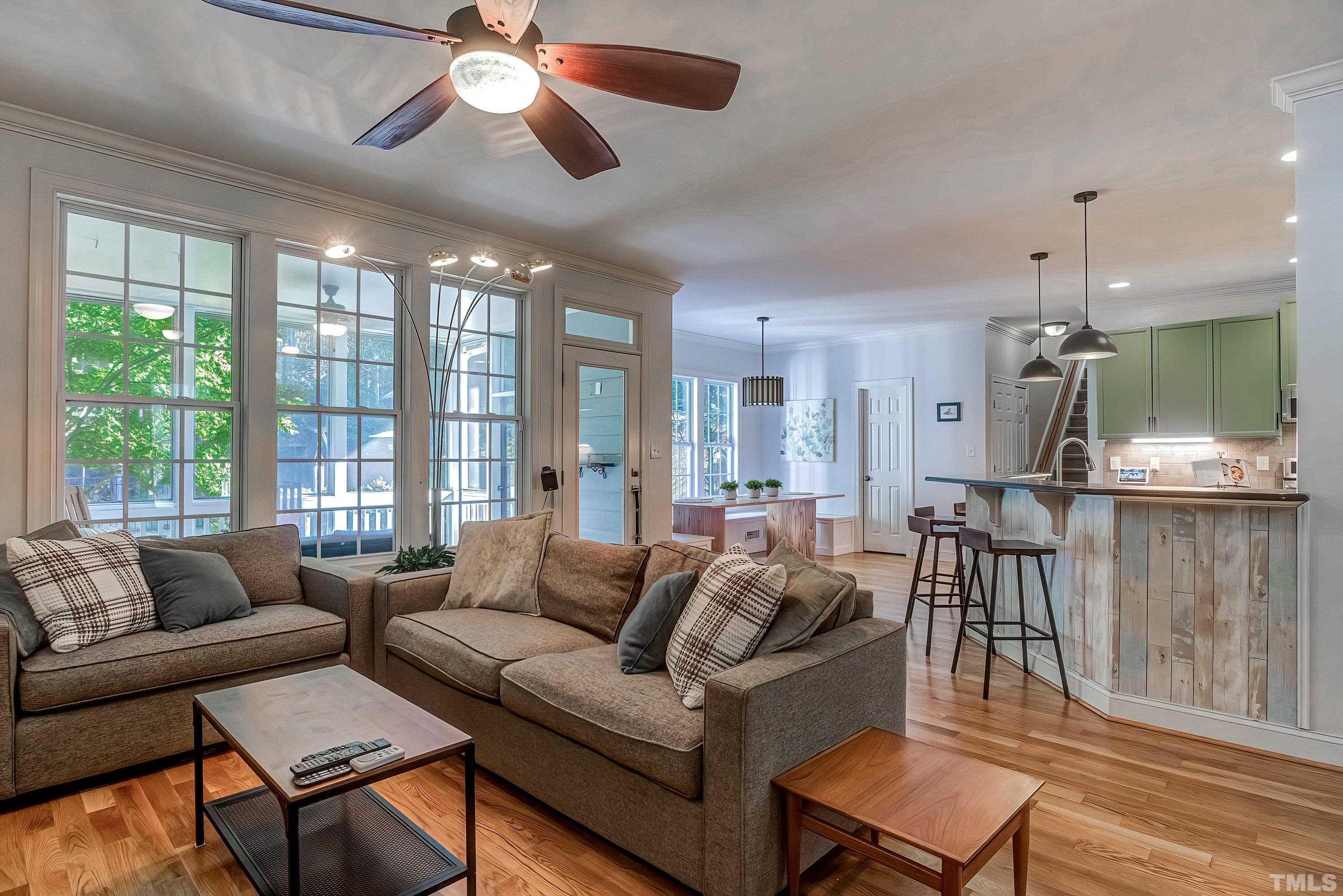 1613 Strategy Way Wake Forest, NC 27587 - Photo 14 of 58 a living room with furniture and a large window