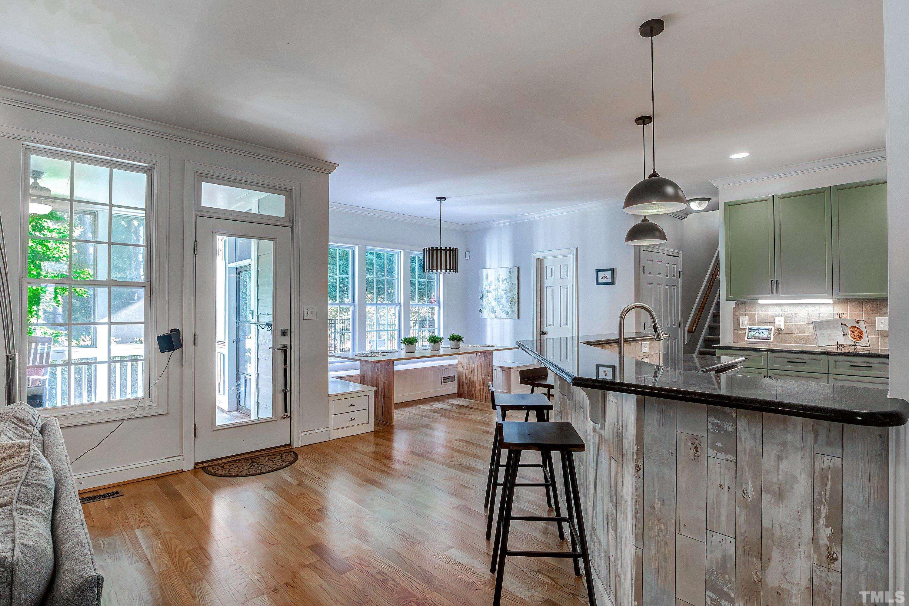 1613 Strategy Way Wake Forest, NC 27587 - Photo 15 of 58 a very nice looking room with many windows