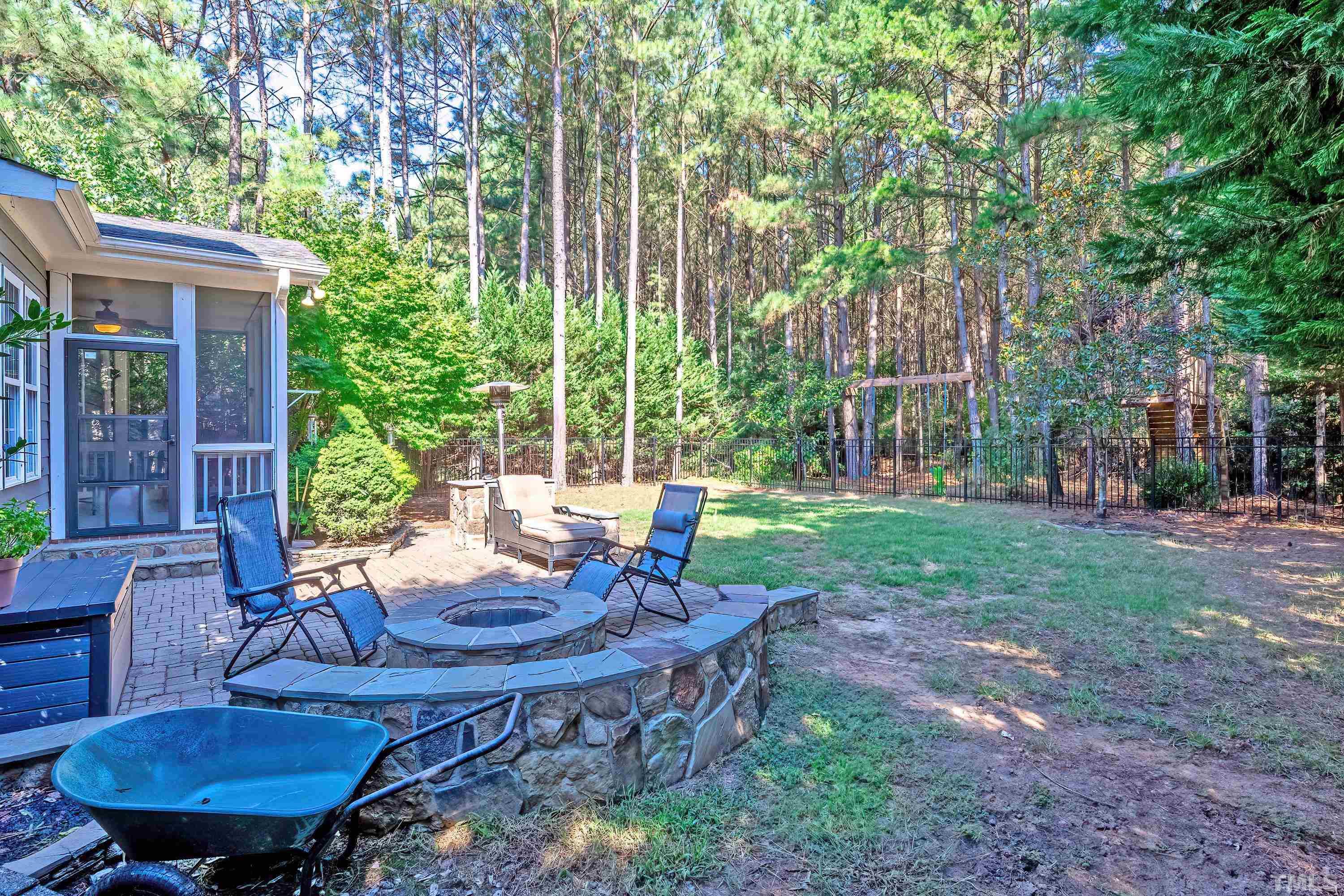1613 Strategy Way Wake Forest, NC 27587 - Photo 49 of 58 a view of backyard with seating and green space