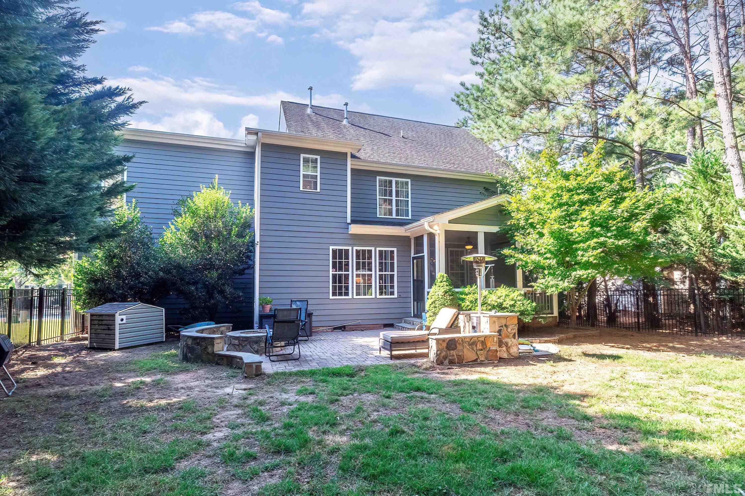 1613 Strategy Way Wake Forest, NC 27587 - Photo 50 of 58 a view of a house with backyard and sitting area
