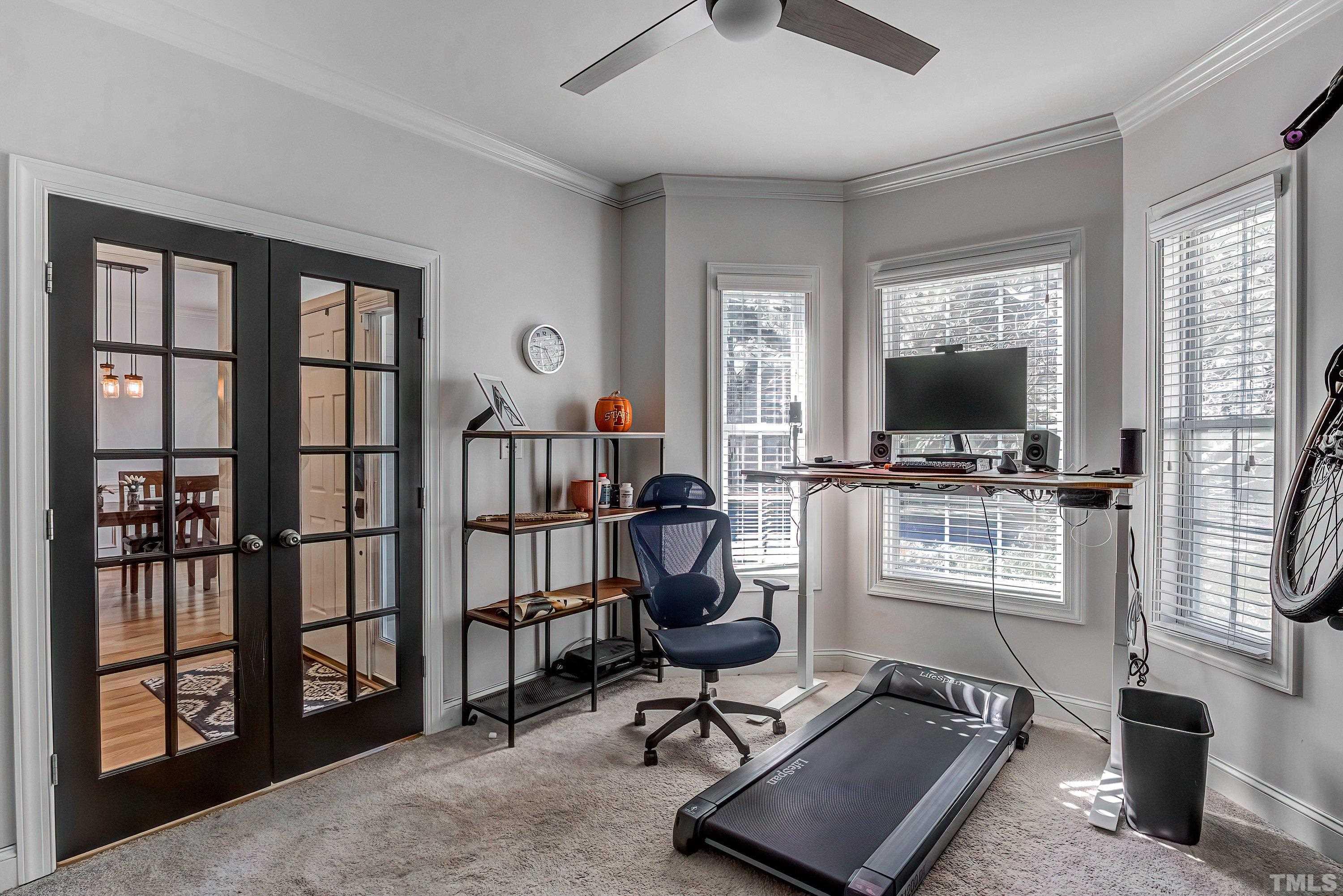 1613 Strategy Way Wake Forest, NC 27587 - Photo 8 of 58 a view of a workspace with furniture and a window