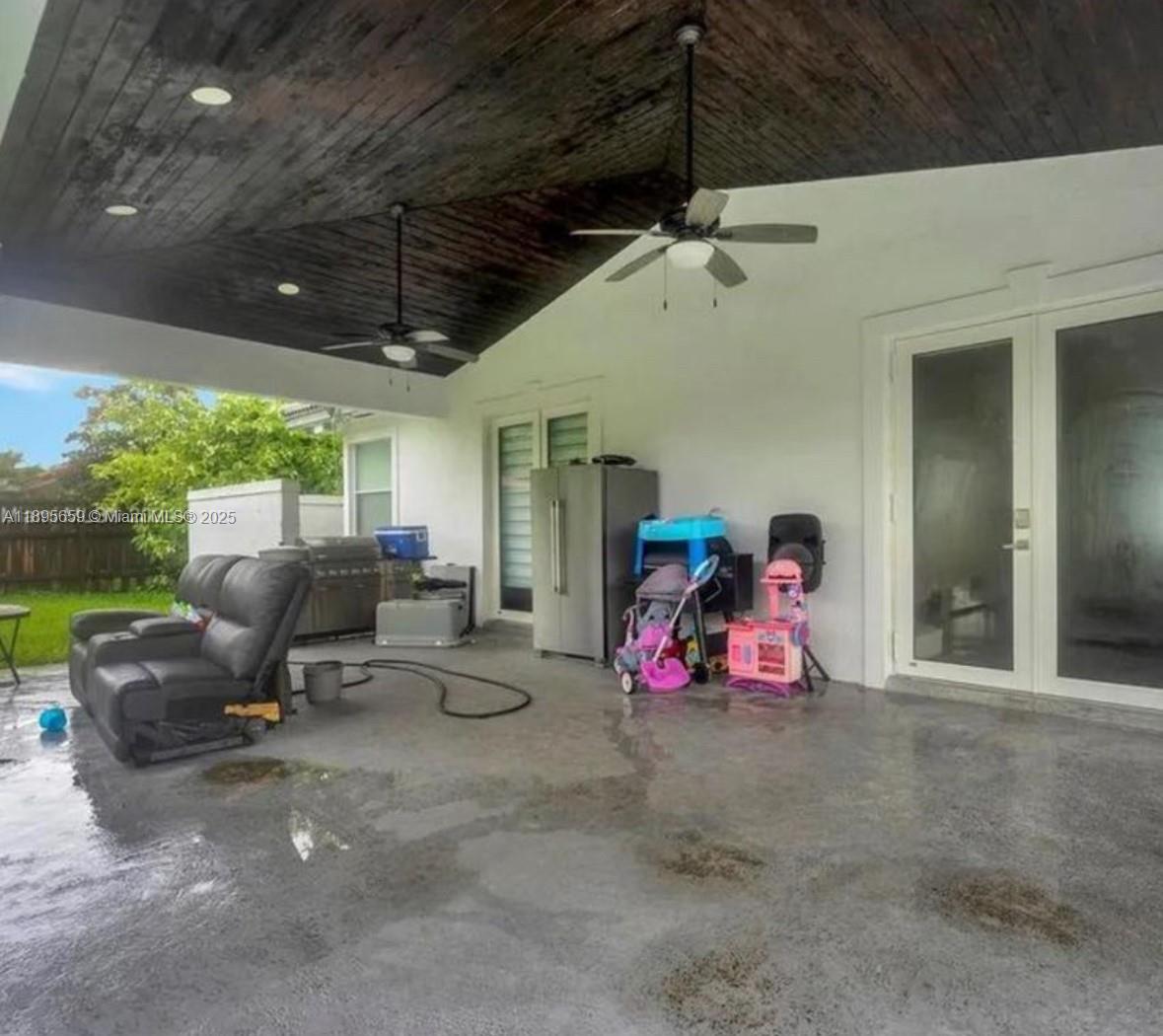 19905 Southwest 135th Avenue Miami, FL 33177 - Photo 28 of 34 a view of a room with gym equipment