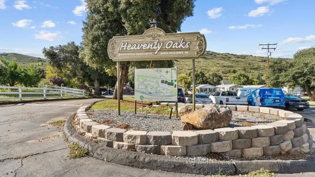 a view of a park with welcome board