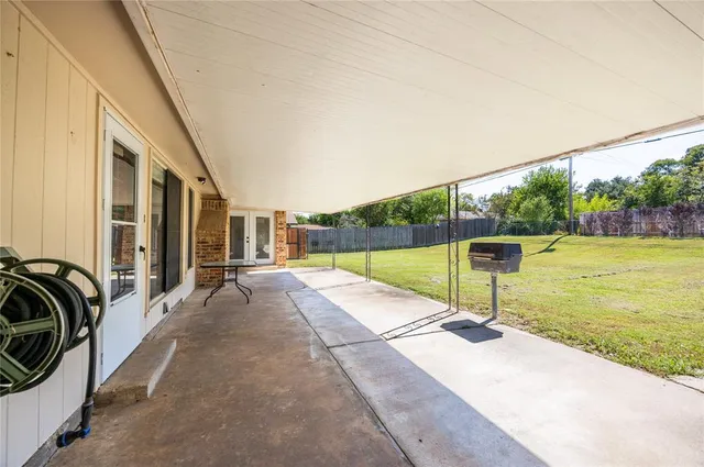 a view of a street with a patio