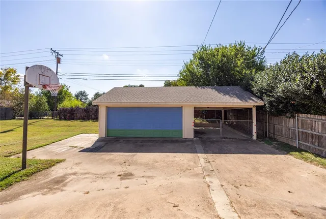a house view with a backyard space