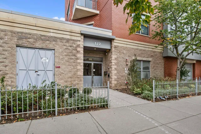 front view of a house with a garden