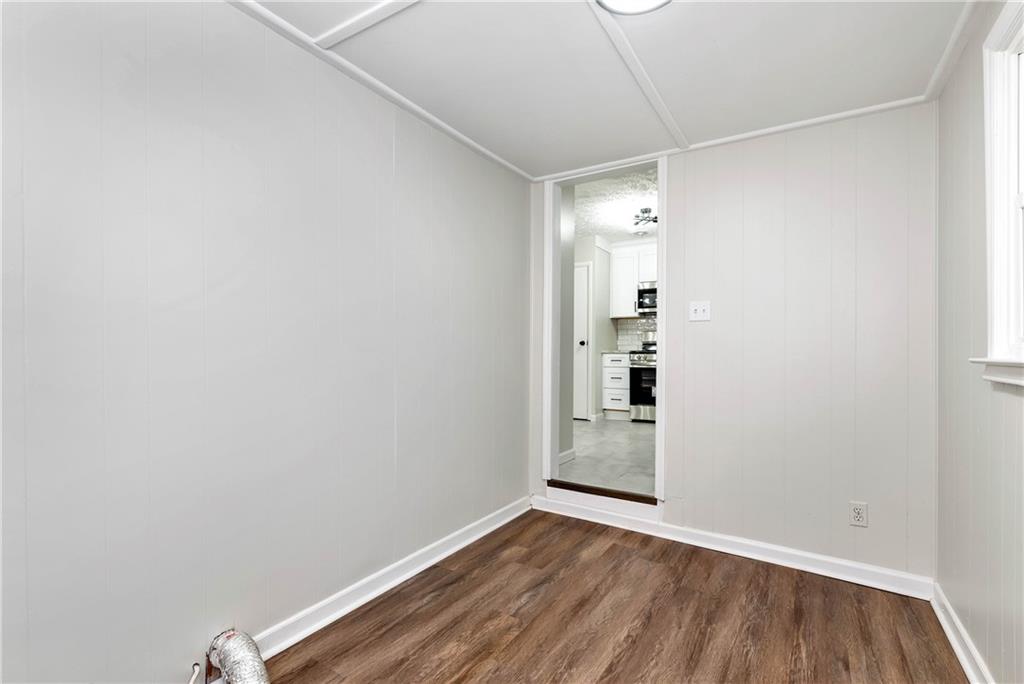 145 Beaverdam Road Winterville, GA 30683 - Photo 22 of 53 a view of a room with wooden floor and entryway