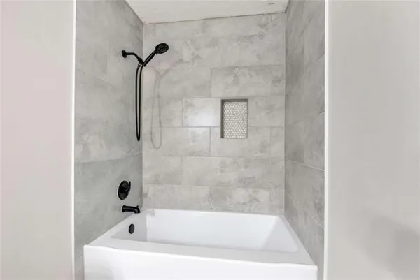 a bathroom with a bathtub