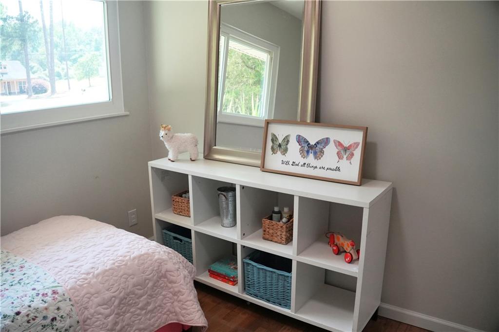 145 Beaverdam Road Winterville, GA 30683 - Photo 25 of 53 a bedroom with a bed and a window
