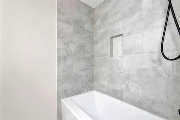 a bathroom with a bathtub