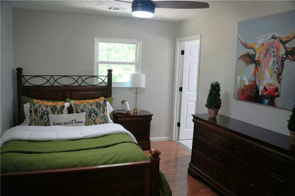 145 Beaverdam Road Winterville, GA 30683 - Photo 30 of 53 a bedroom with a bed and a window