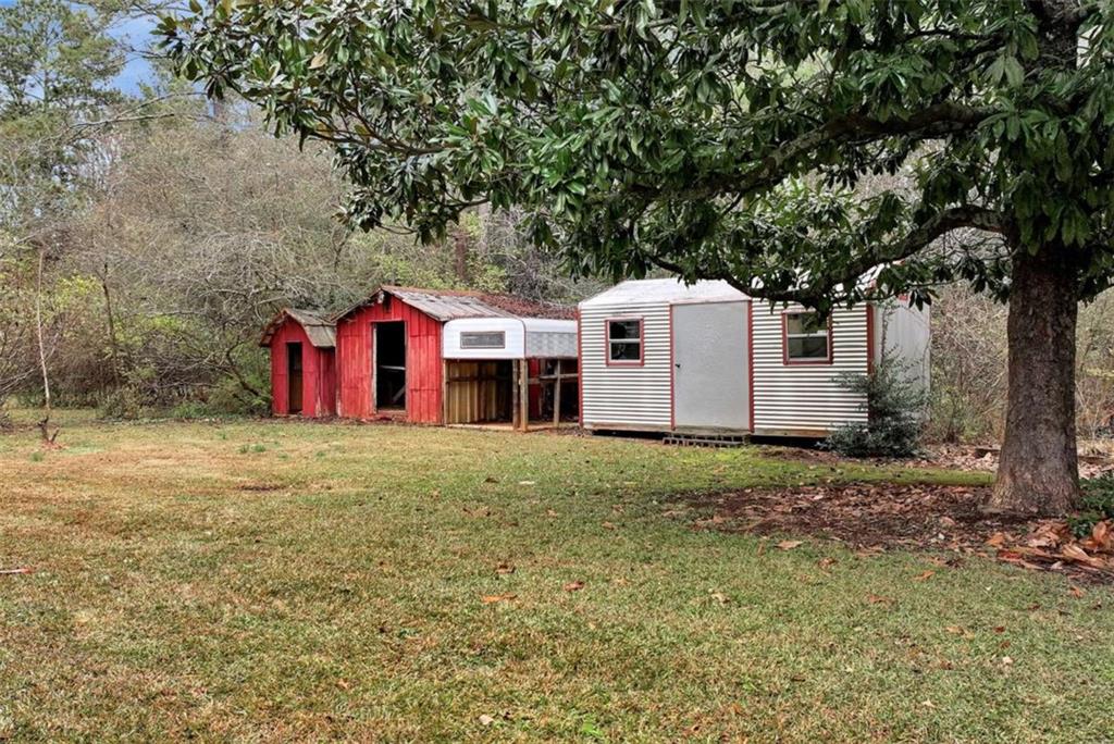 145 Beaverdam Road Winterville, GA 30683 - Photo 32 of 39 a front view of a house with a yard