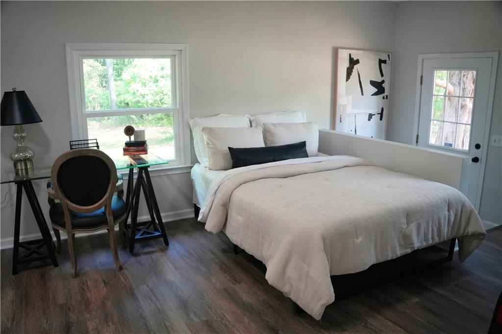 145 Beaverdam Road Winterville, GA 30683 - Photo 36 of 53 a bed room with a bed and a chair