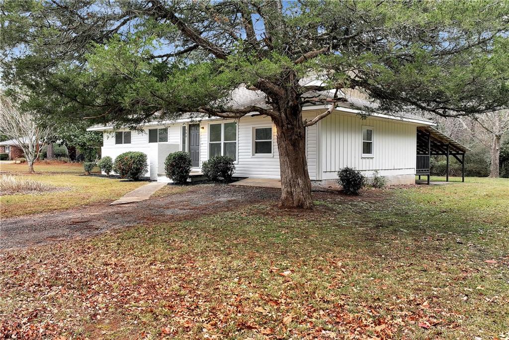 145 Beaverdam Road Winterville, GA 30683 - Photo 53 of 53 a front view of a house with a yard