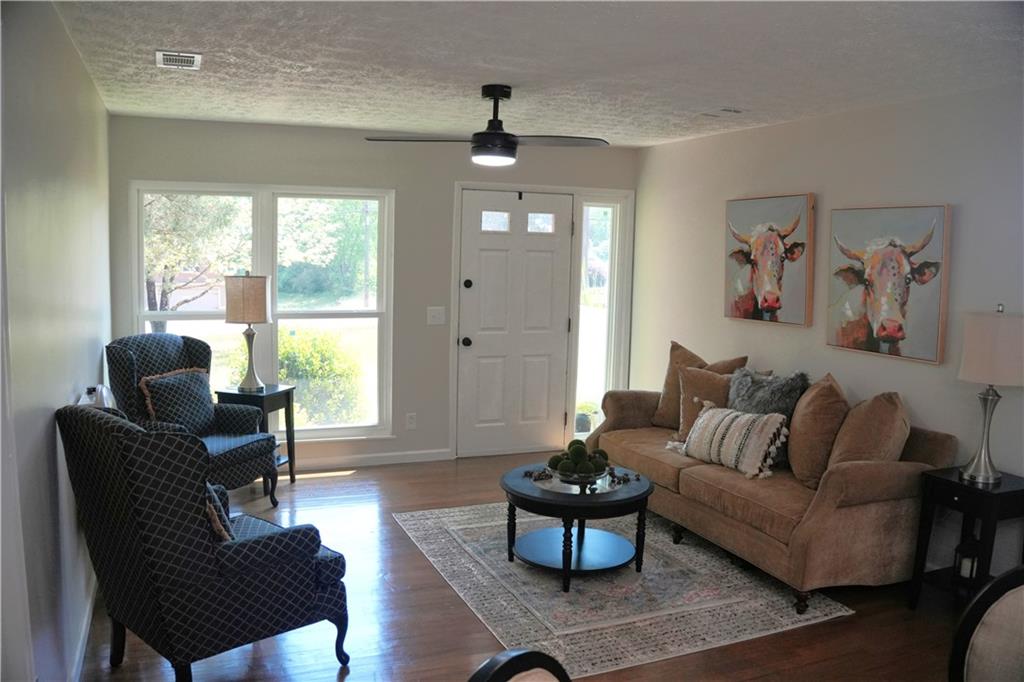 145 Beaverdam Road Winterville, GA 30683 - Photo 9 of 53 a living room with furniture