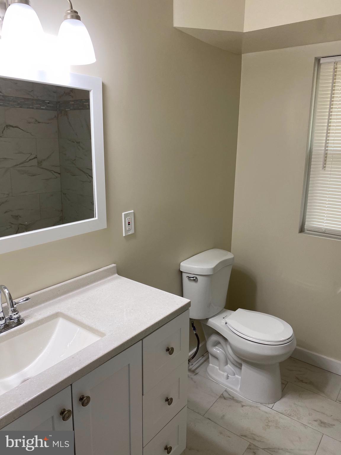 15702 Livingston Road Accokeek, MD 20607 - Photo 8 of 25 Bathroom view with new sink vanity & fixtures