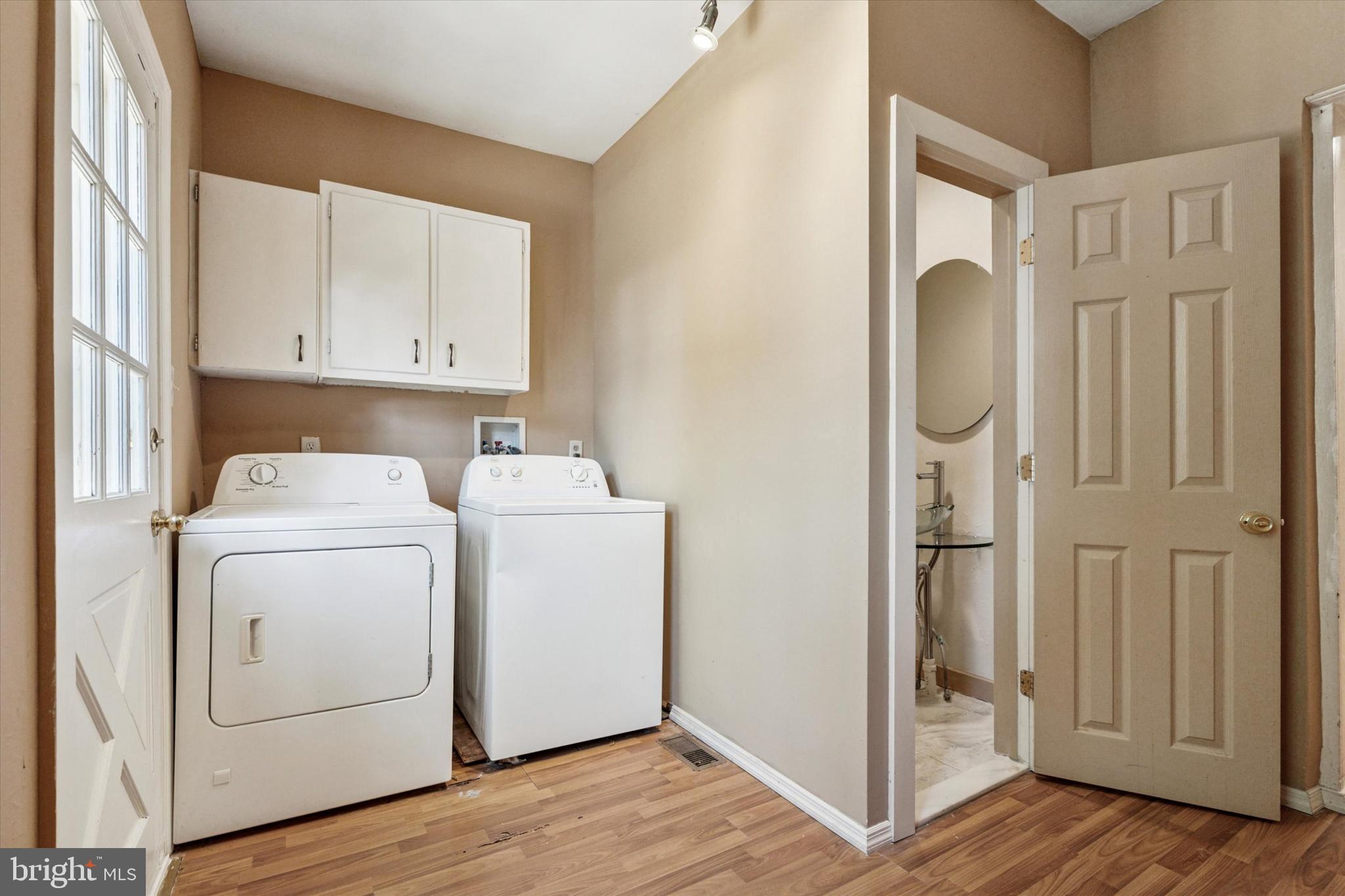4148 Manayunk Avenue Philadelphia, PA 19128 - Photo 9 of 15 a view of storage and utility room with wooden floor