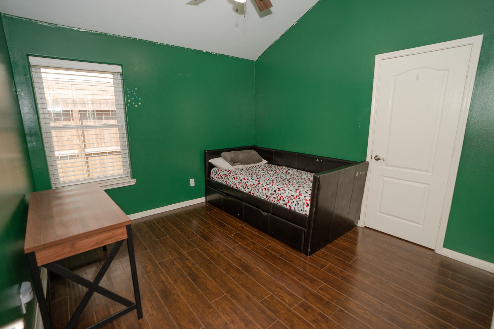 17426 Colony Creek Drive Spring, TX 77379 - Photo 16 of 26 a bedroom with a bed and a window