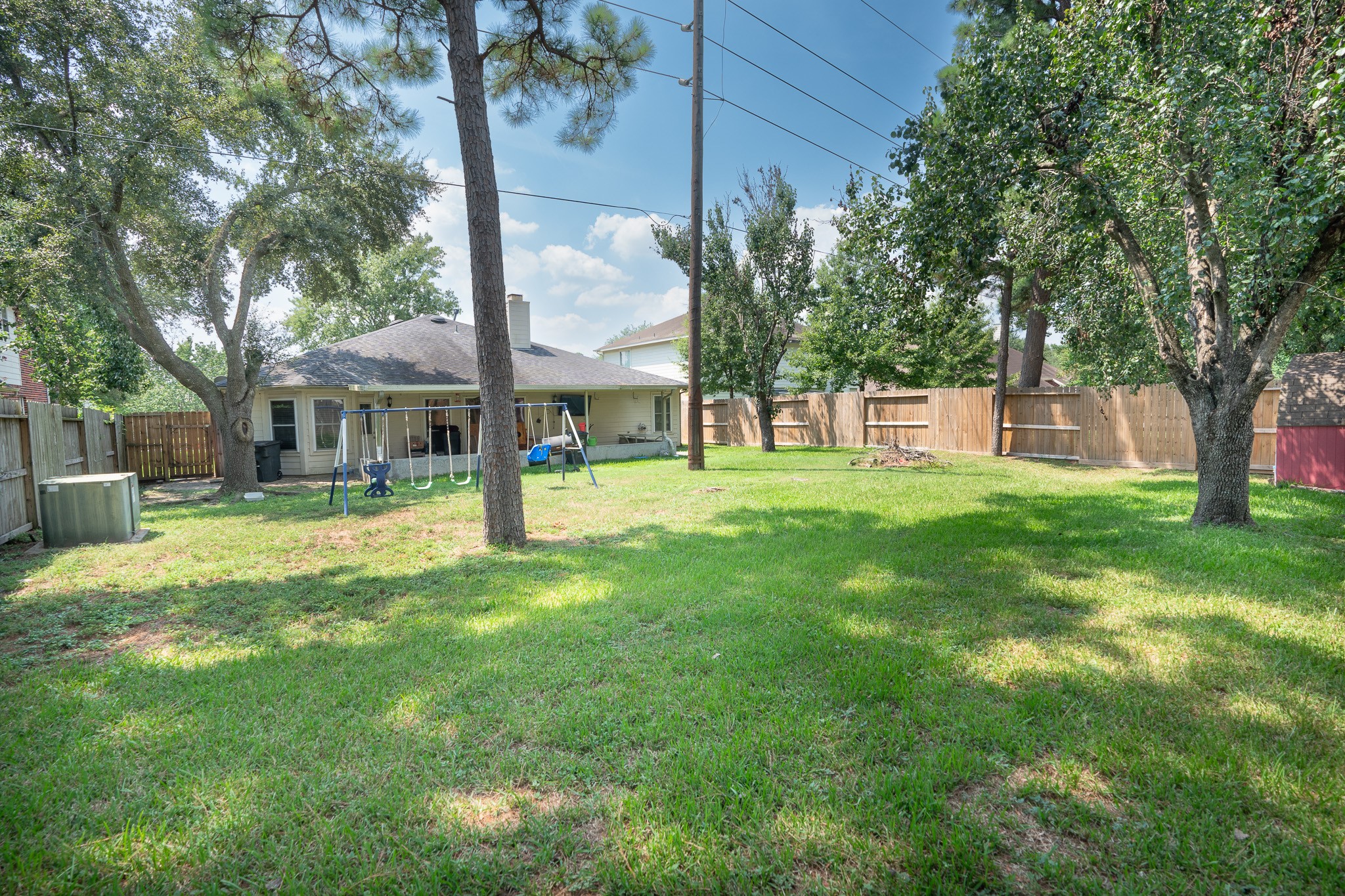 17426 Colony Creek Drive Spring, TX 77379 - Photo 22 of 26 a view of a house with a yard
