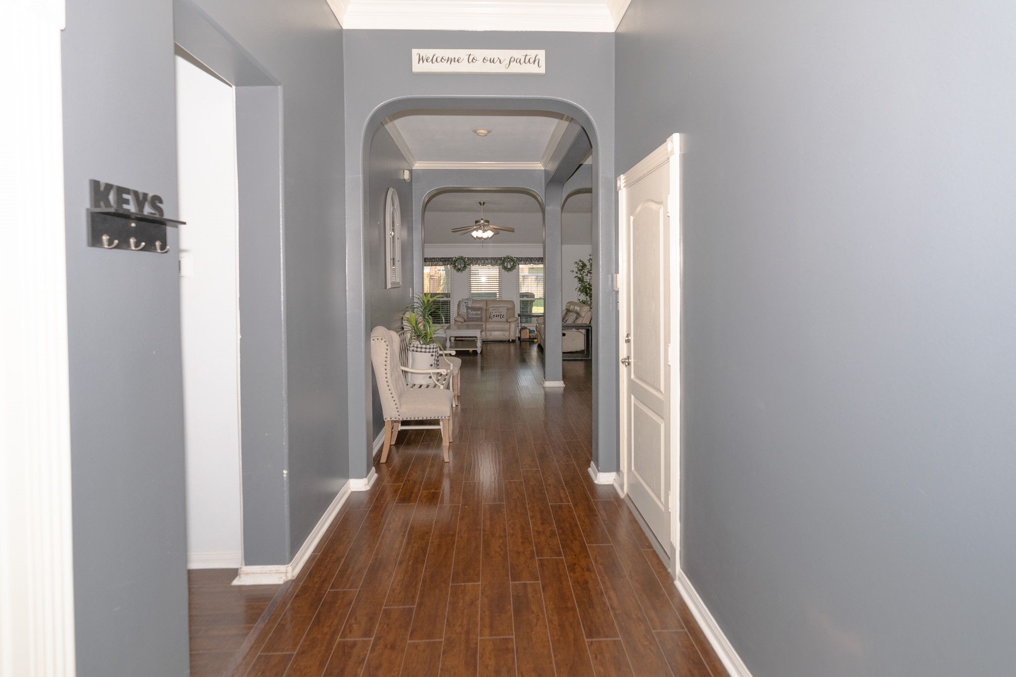 17426 Colony Creek Drive Spring, TX 77379 - Photo 4 of 26 a view of a hallway with wooden floor