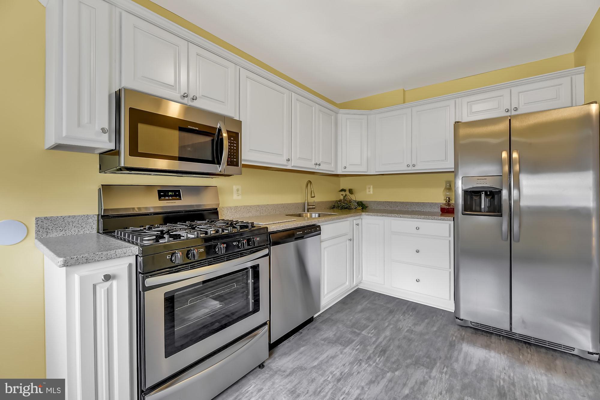 774 Lannerton Road Baltimore, MD 21220 - Photo 8 of 24 Kitchen remodeled w/ new cabinets & SS appliances