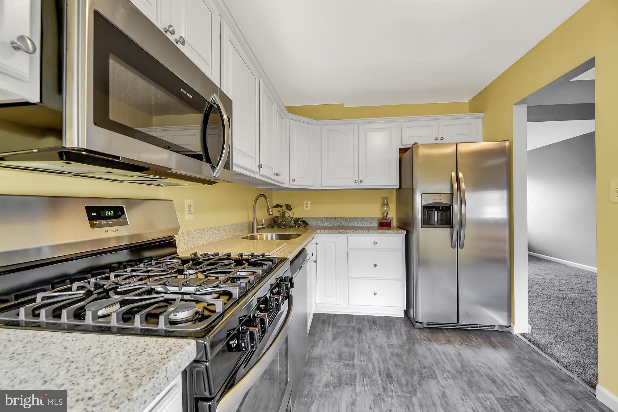 774 Lannerton Road Baltimore, MD 21220 - Photo 9 of 24 Upgraded quartz countertops and fresh paint