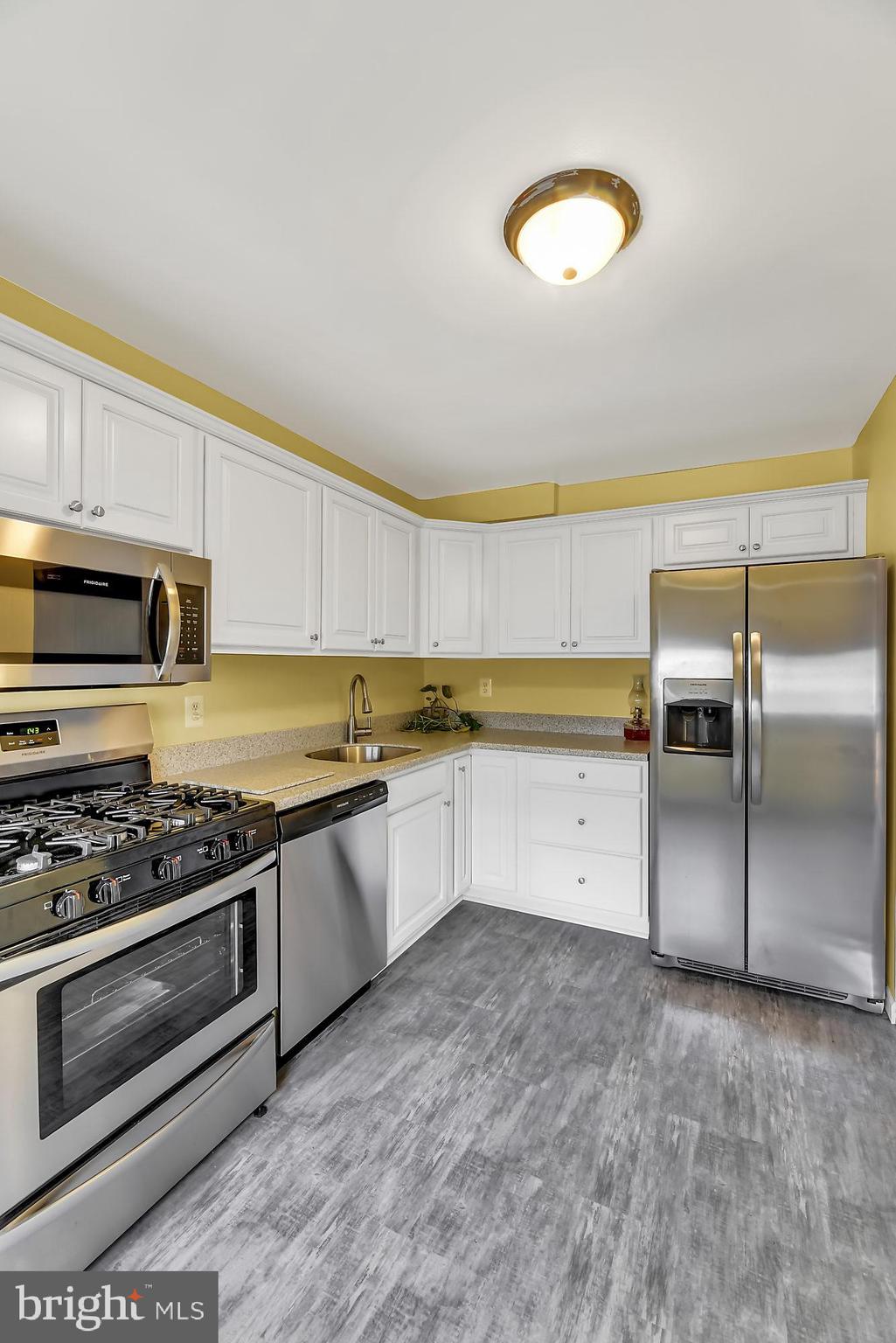 774 Lannerton Road Baltimore, MD 21220 - Photo 10 of 24 Kitchen with new vinyl flooring